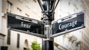 Street Sign Courage Versus Fear